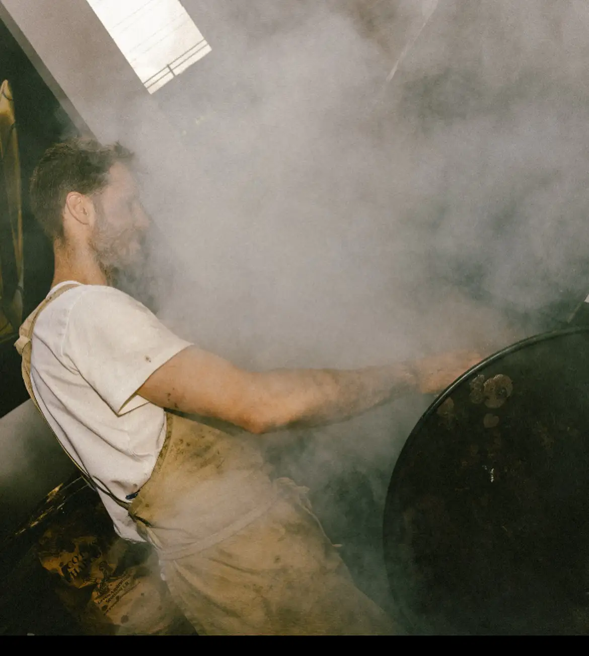 Dean cooking in smokey kitchen